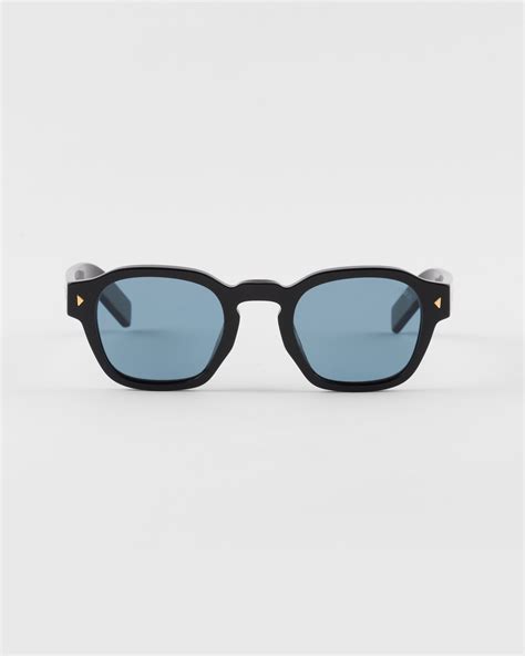 Turquoise Lenses Sunglasses With Iconic Metal Plaque .